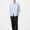 Camisas unisex de tela de sarga | Botones en el cuello | A cuadros