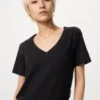 Camiseta de cuello en V de algodón slub para mujer