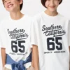 Camiseta infantil AIRism de algodón con estampado
