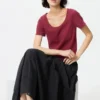 Camiseta mini de cuello redondo con punto calado para mujer