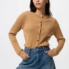 Cárdigan de punto elástico de merino para mujer en pantalones cortos Cárdigan de punto elástico de merino para mujer en pantalones cortos