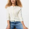 Cárdigan de punto elástico de merino para mujer en pantalones cortos Cárdigan de punto elástico de merino para mujer en pantalones cortos