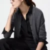 Cárdigan de punto elástico de merino para mujer en pantalones cortos Cárdigan de punto elástico de merino para mujer en pantalones cortos