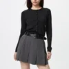 Cárdigan de punto elástico de merino para mujer en pantalones cortos Cárdigan de punto elástico de merino para mujer en pantalones cortos