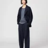 Pantalones anchos plisados de algodón y lyocell para mujer