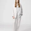 Pantalones anchos plisados de algodón y lyocell para mujer