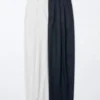 Pantalones anchos plisados de algodón y lyocell para mujer