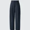 Pantalones anchos plisados de algodón y lyocell para mujer