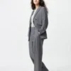 Pantalones anchos plisados para mujer