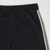 Pantalones de chándal unisex con rayas laterales | Talla alta Pantalones de chándal unisex con rayas laterales | Talla alta