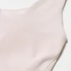 Partes de arriba deportivas sin mangas AIRism para mujer