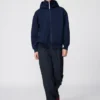 Sudadera unisex oversize con capucha y cremallera completa Sudadera unisex oversize con capucha y cremallera completa